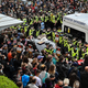 Image for article titled Hero Protestor Laid Under Immigration Van For Eight Hours To Stop Raid